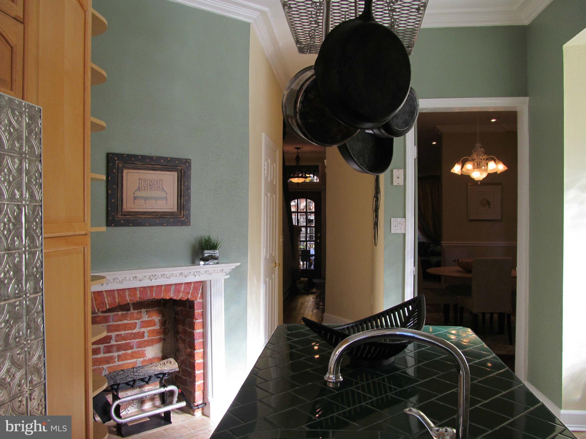 1908 6th Street Northwest Washington, DC 20001 - Photo 12 of 30 a close view of shoes and a fireplace with wooden floor