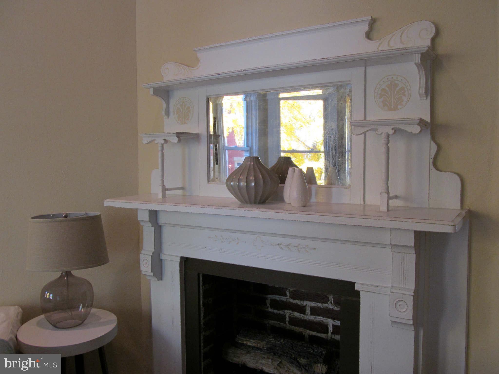 1908 6th Street Northwest Washington, DC 20001 - Photo 17 of 30 a kitchen with a sink and a fireplace