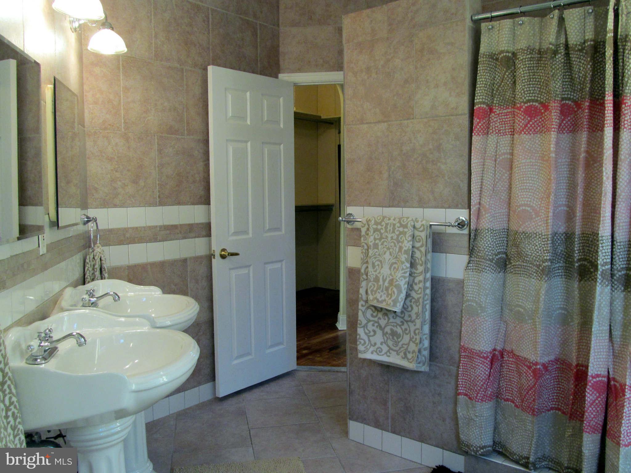 1908 6th Street Northwest Washington, DC 20001 - Photo 27 of 30 a bathroom with a bathtub and a sink