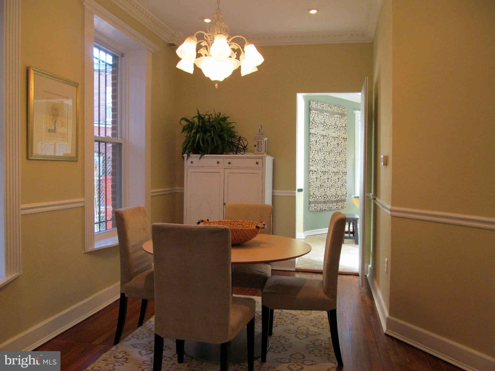 1908 6th Street Northwest Washington, DC 20001 - Photo 9 of 30 a view of a dining room with furniture window and outside view