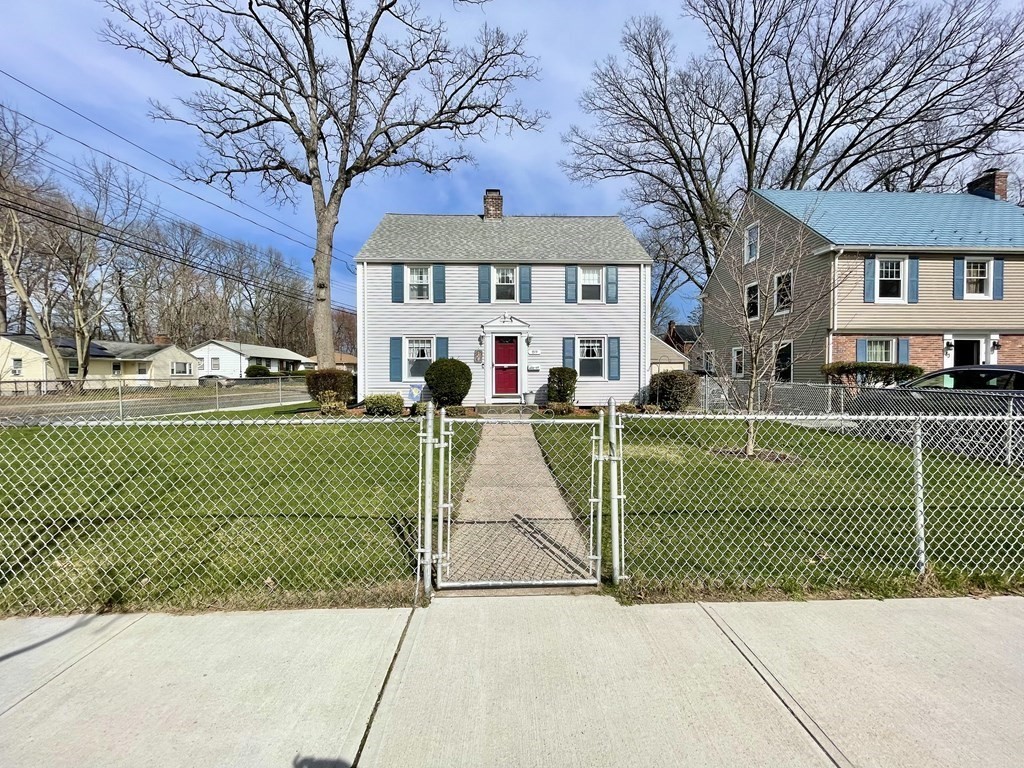 a view of a yard with a fountain