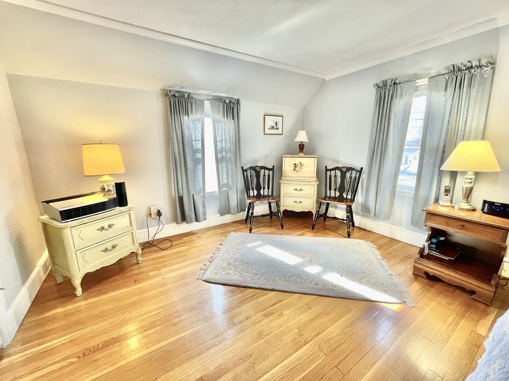 89 Wexford Street Springfield, MA 01118 - Photo 14 of 38 a living room with furniture and a wooden floor