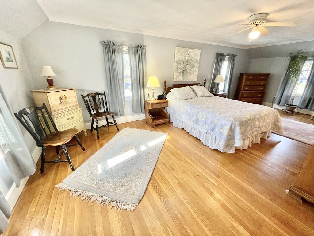 89 Wexford Street Springfield, MA 01118 - Photo 15 of 38 a bed room with a bed and a chair