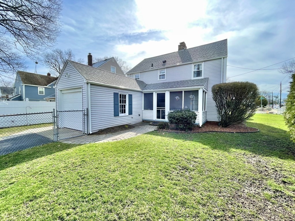 89 Wexford Street Springfield, MA 01118 - Photo 2 of 38 a view of a house with a yard and a large tree