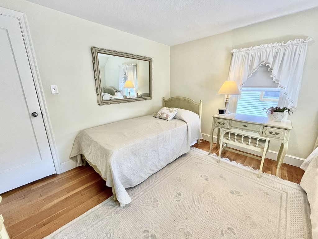 89 Wexford Street Springfield, MA 01118 - Photo 21 of 38 a bedroom with a bed and a window