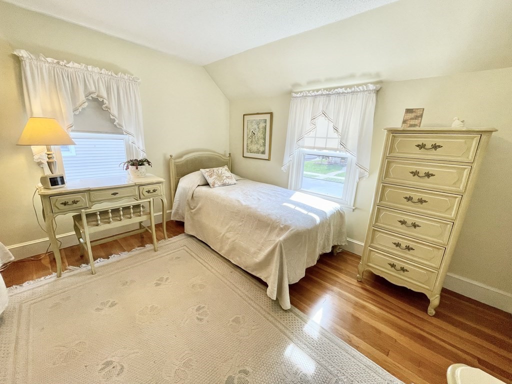 89 Wexford Street Springfield, MA 01118 - Photo 23 of 38 a bedroom with a bed and a dresser
