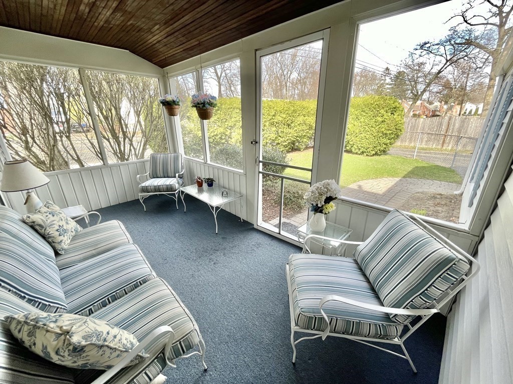89 Wexford Street Springfield, MA 01118 - Photo 30 of 38 a living room with furniture and a floor to ceiling window