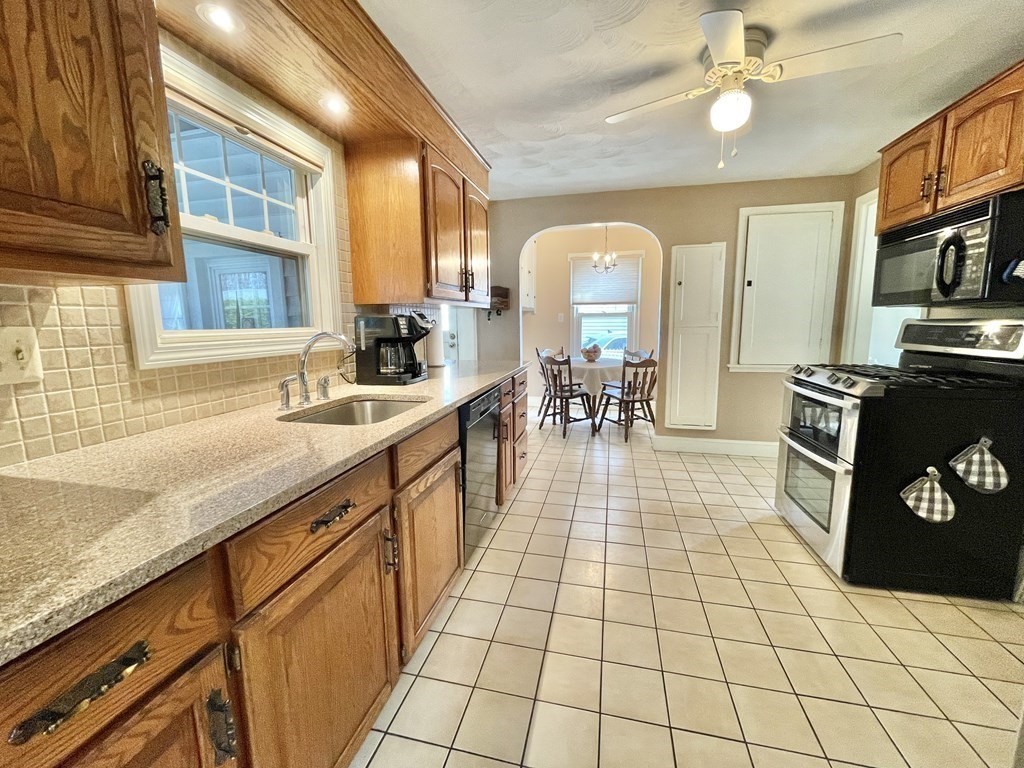 89 Wexford Street Springfield, MA 01118 - Photo 7 of 38 a very nice looking kitchen with a large window