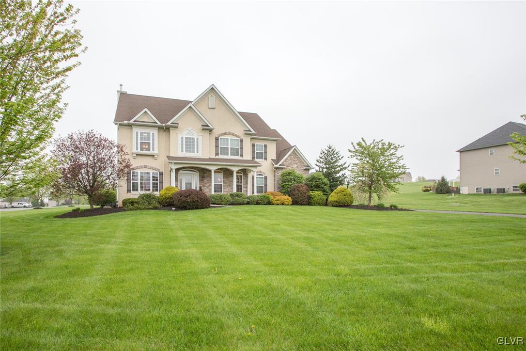 216 East Dell Road Bath, PA 18014 - Photo 2 of 42 a front view of a house with a yard