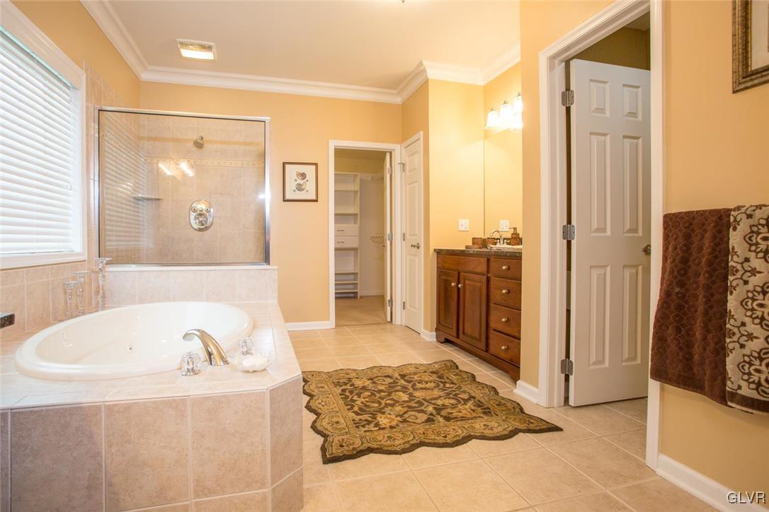216 East Dell Road Bath, PA 18014 - Photo 25 of 42 a bathroom with a tub sink and shower