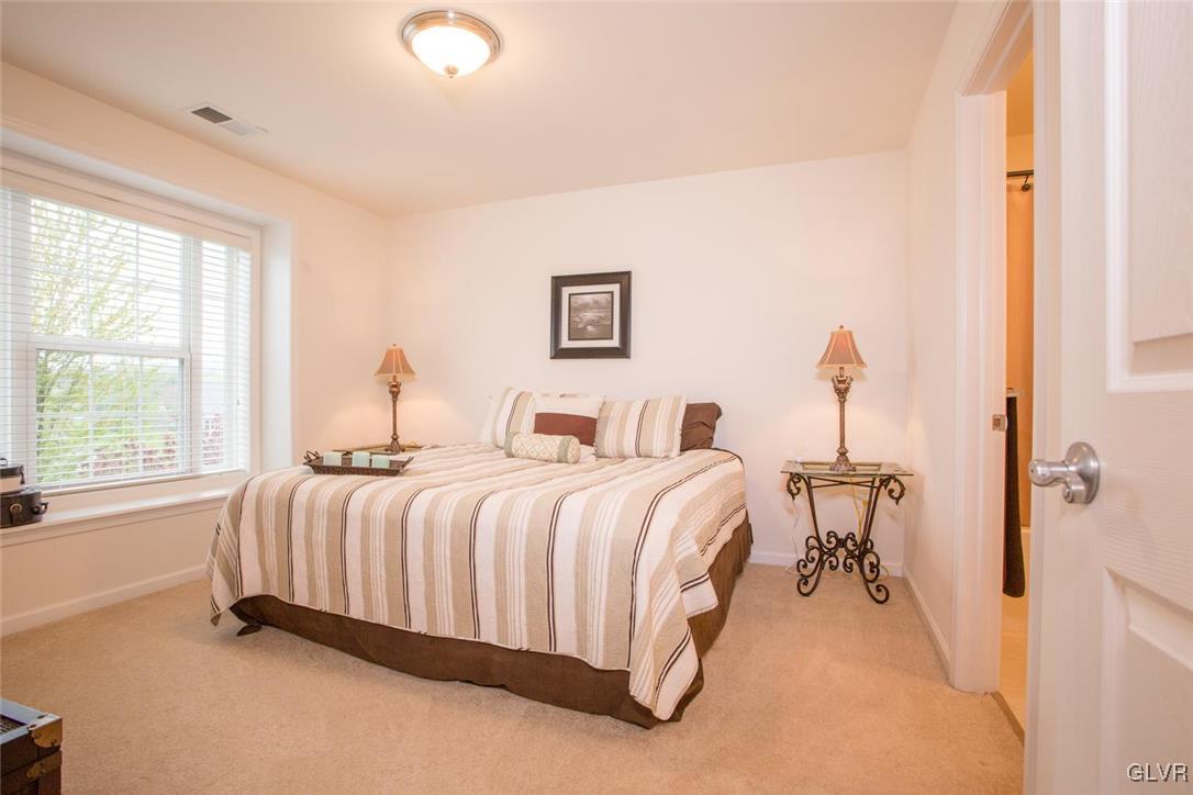 216 East Dell Road Bath, PA 18014 - Photo 28 of 42 a spacious bedroom with a bed and a window