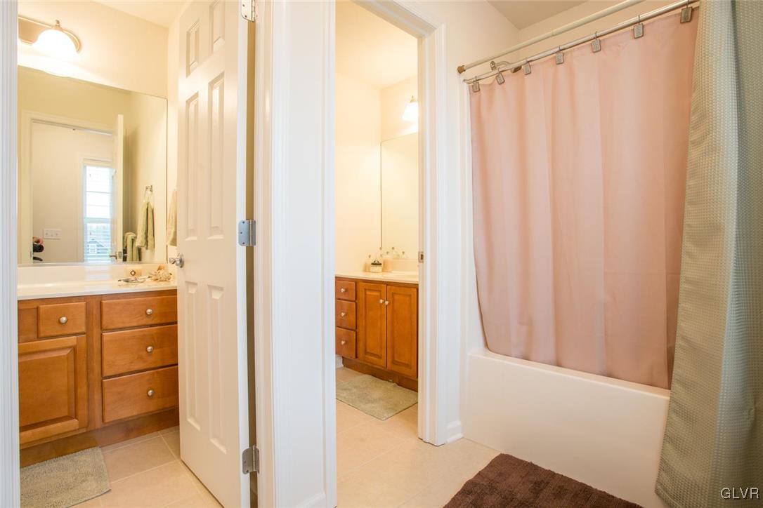 216 East Dell Road Bath, PA 18014 - Photo 33 of 42 a bathroom with a shower curtain and a sink
