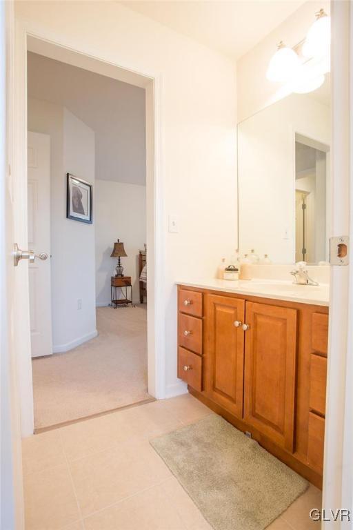 216 East Dell Road Bath, PA 18014 - Photo 34 of 42 a en suite bathroom with a sink double vanity and a mirror