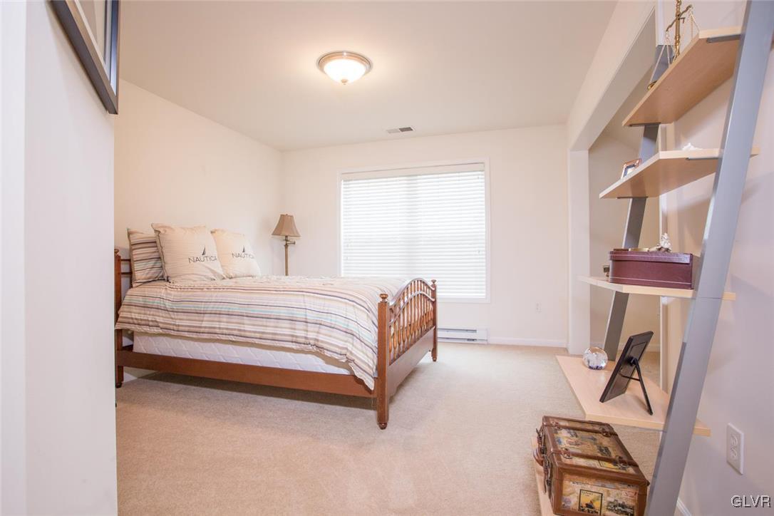 216 East Dell Road Bath, PA 18014 - Photo 35 of 42 a bedroom with a bed and a mirror