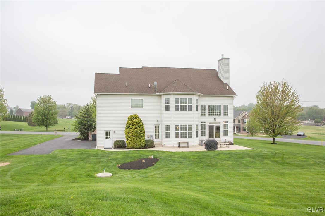 216 East Dell Road Bath, PA 18014 - Photo 40 of 42 a front view of a house with a yard