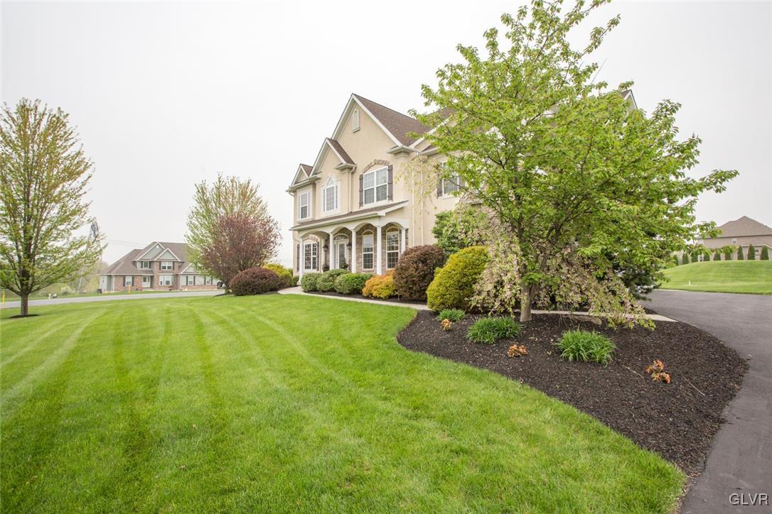 216 East Dell Road Bath, PA 18014 - Photo 42 of 42 a view of an house with backyard and a tree