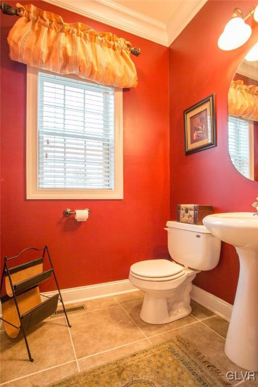 216 East Dell Road Bath, PA 18014 - Photo 7 of 42 a bathroom with a toilet a sink and a window