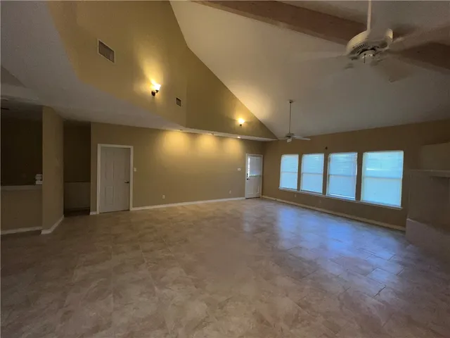 an empty room with windows