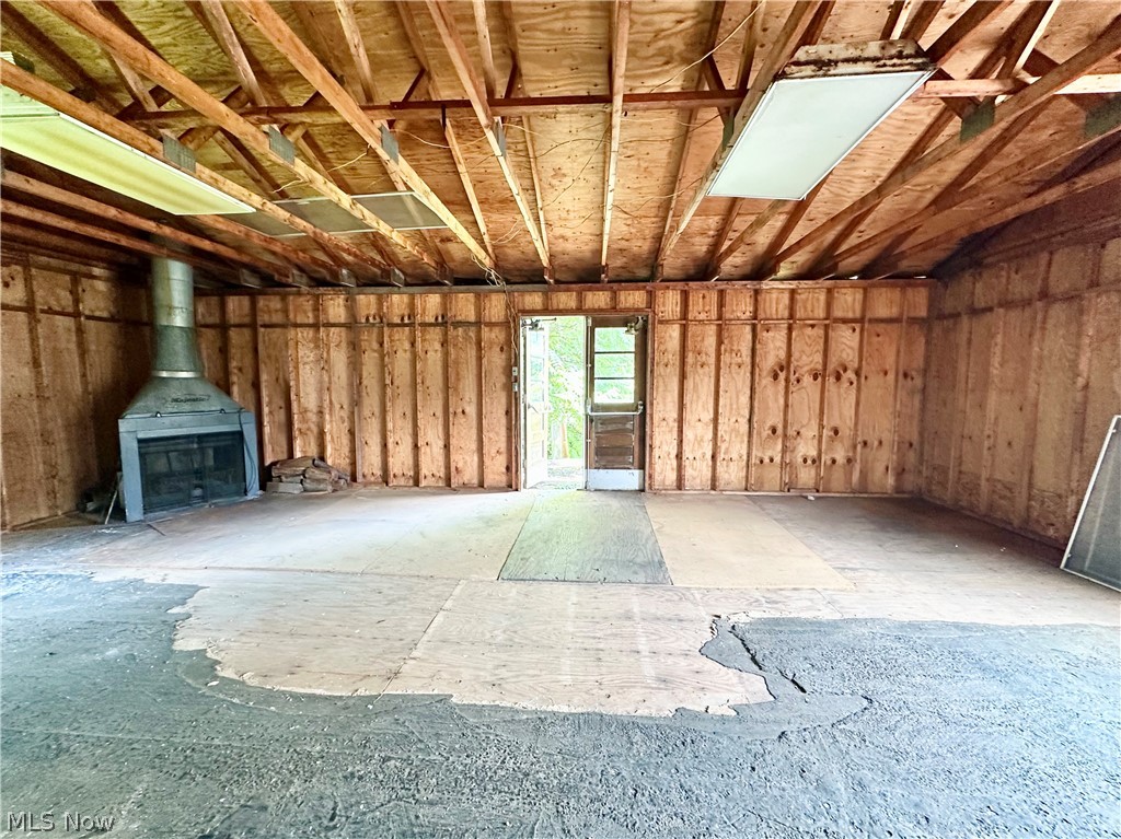 28 Richter Road Colliers, WV 26035 - Photo 38 of 38 Upper level of garage featuring a wood burner