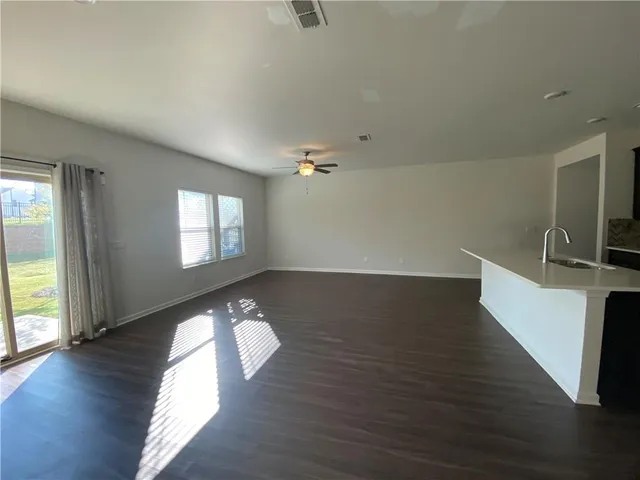 a view of a livingroom with wooden floor