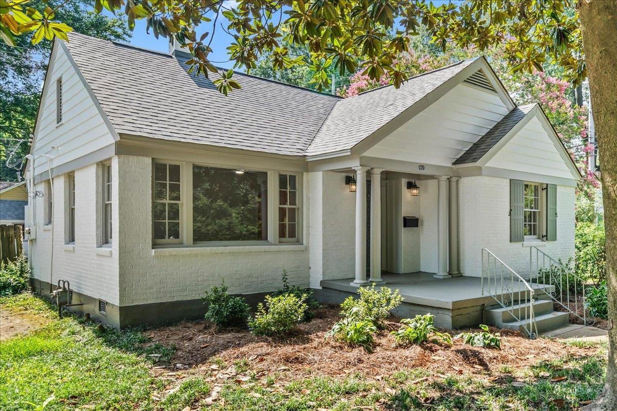 170 South Greer Street Memphis, TN 38111 - Photo 24 of 35 White brick exterior featuring a covered porch with architectural columns