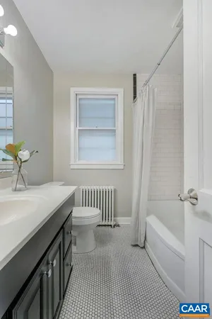 a bathroom with a sink and a bathtub