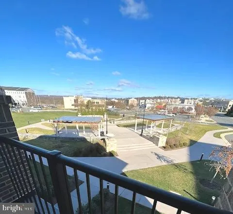 a view of swimming pool from a balcony