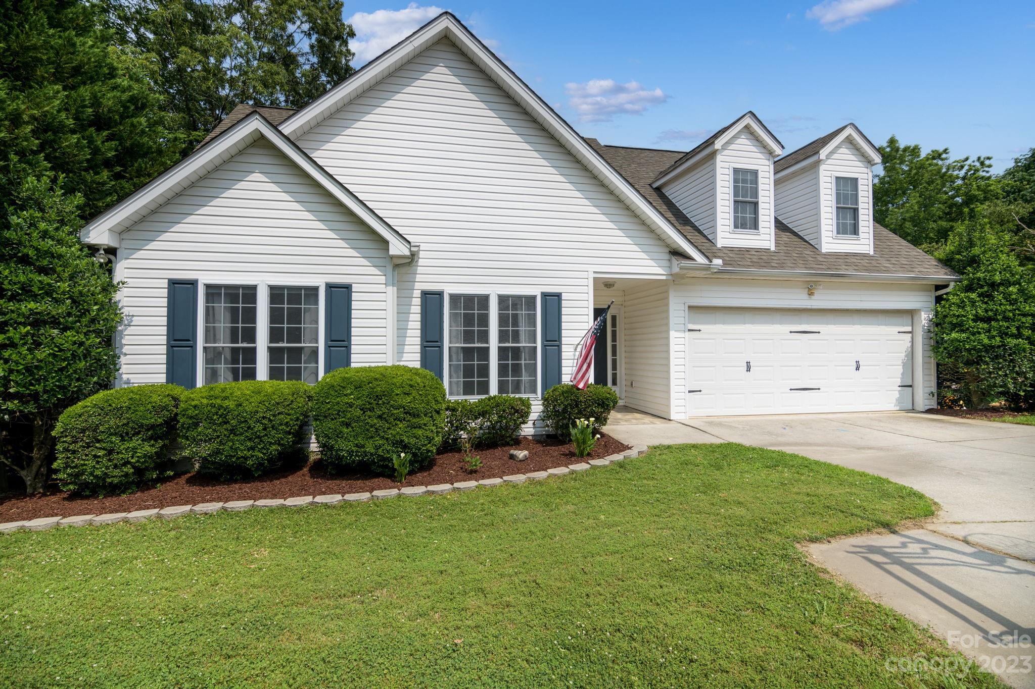 12129 Woodholm Court Tega Cay, SC 29708 - Photo 1 of 27 a front view of a house with a yard