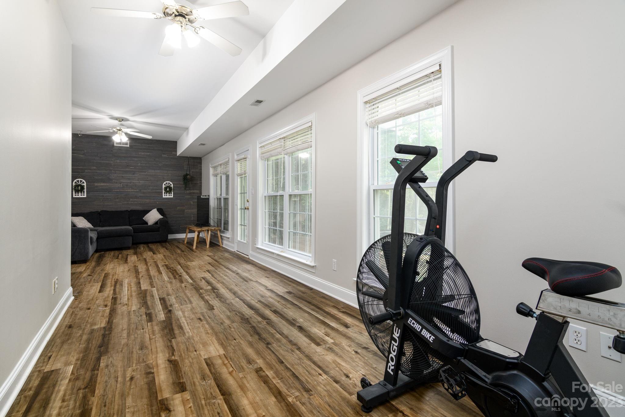 12129 Woodholm Court Tega Cay, SC 29708 - Photo 15 of 27 a view of a room with gym equipment