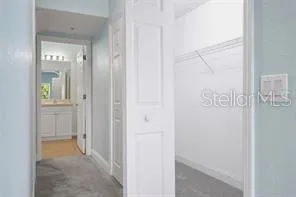 a view of a hallway with two rooms