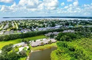 a view of a lake with a city