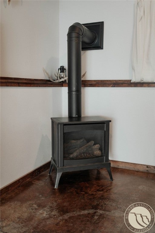 154 Old Divide Road Roundup, MT 59072 - Photo 29 of 35 Gas Stove Family Room.