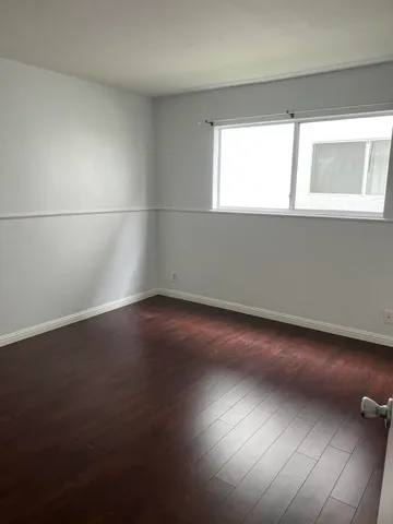 a bathroom with a toilet a sink and a shower