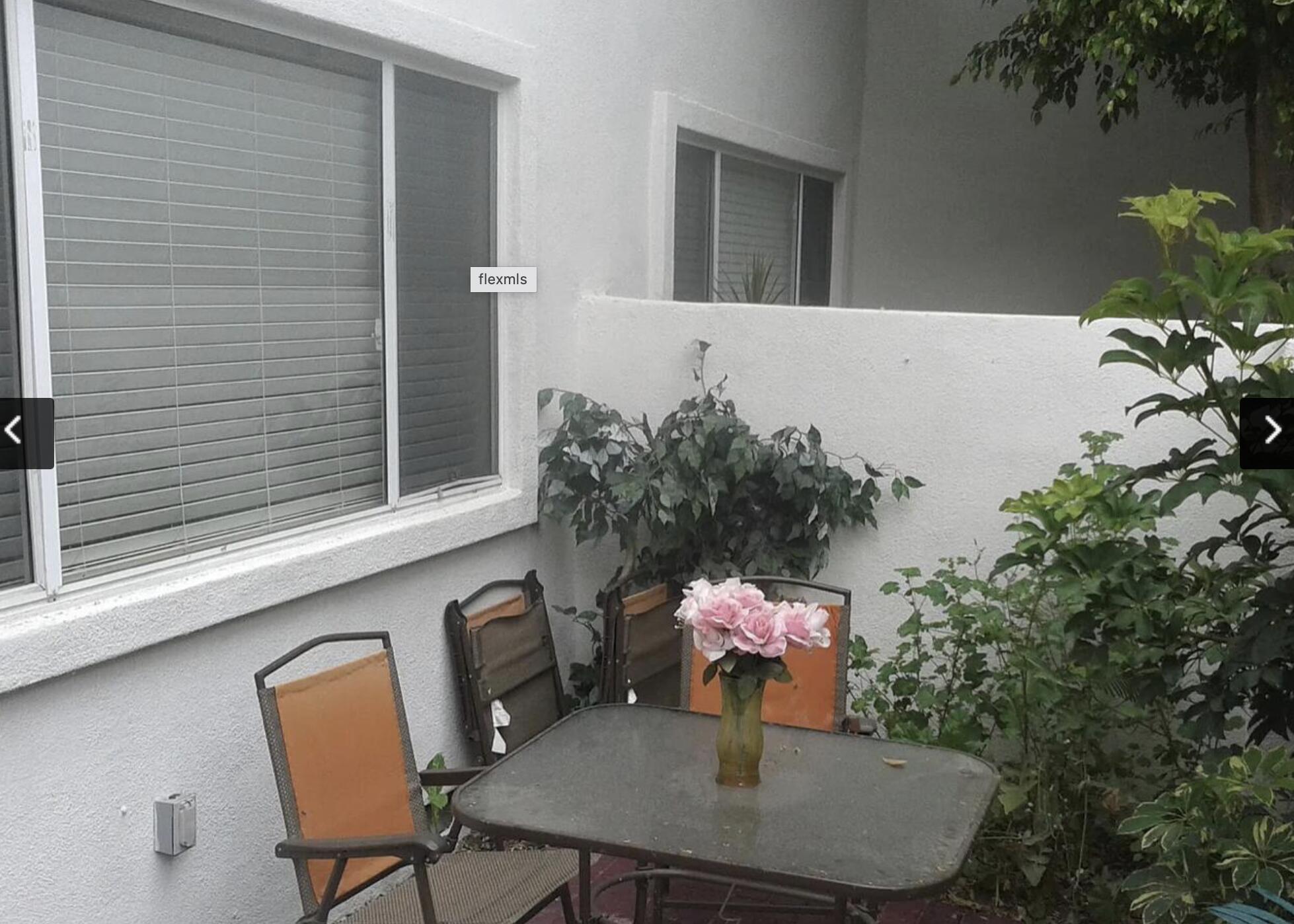 18555 Collins Street, Unit C8 Tarzana, CA 91356 - Photo 22 of 32 a potted plant sitting on a deck