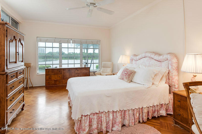 2165 Ibis Isle Road, Unit 2 Palm Beach, FL 33480 - Photo 3 of 7 a bedroom with a bed and a window