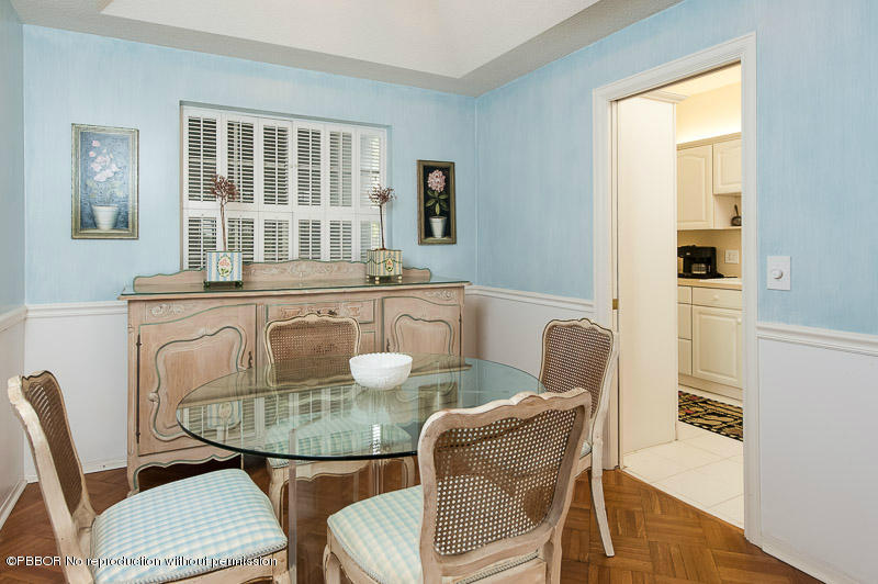 2165 Ibis Isle Road, Unit 2 Palm Beach, FL 33480 - Photo 6 of 7 a dining room with furniture and window