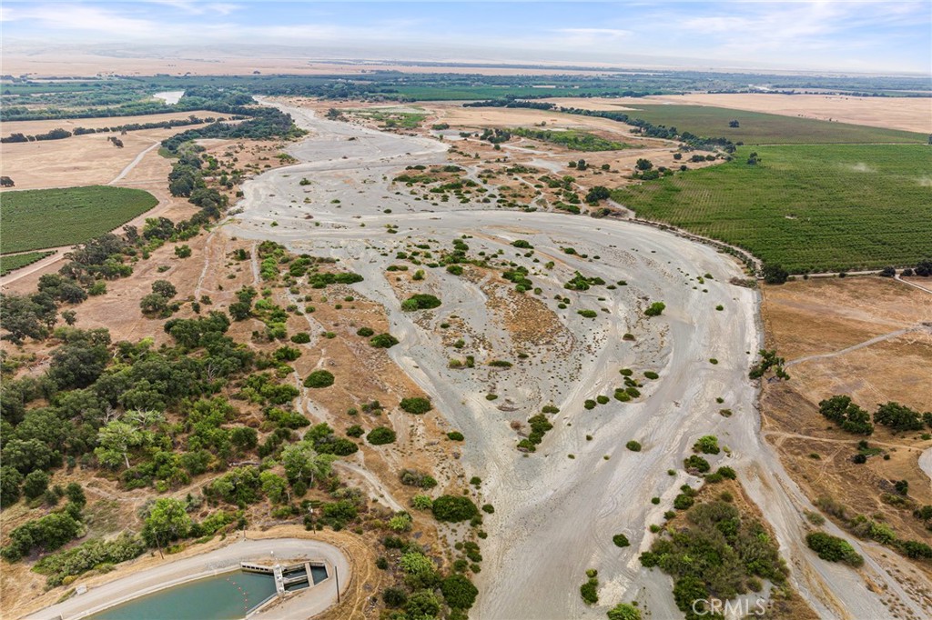 24154 Maria Avenue Corning, CA 96021 - Photo 24 of 40 a view of a lake with beach