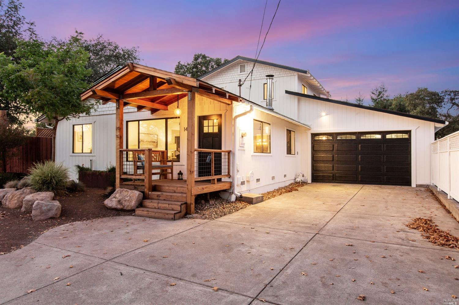 a front view of a house with patio