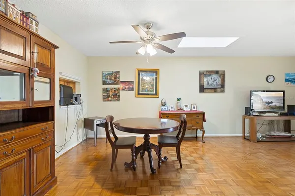 a kitchen with stainless steel appliances kitchen island granite countertop a sink and cabinets