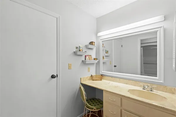 a bathroom with a shower and a toilet