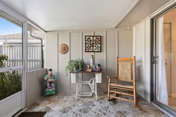 a view of a room with a large window