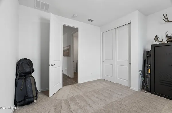 a view of a workspace with furniture