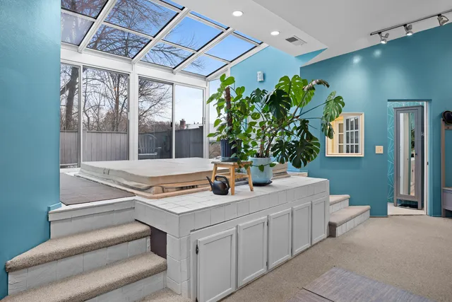 a bathroom with a sink and mirror