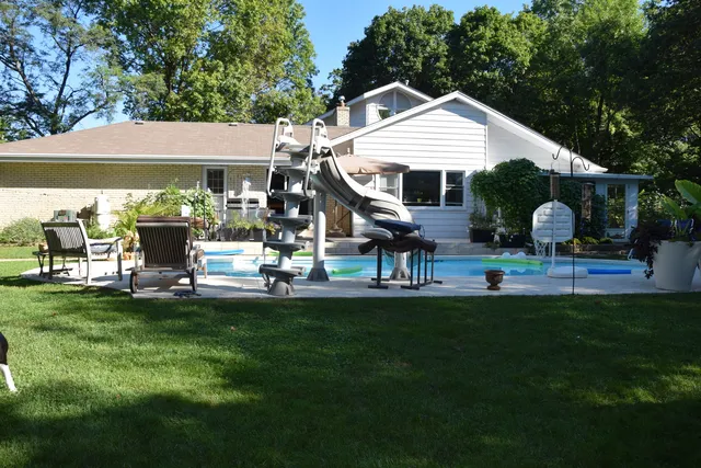 a view of swimming pool from a balcony