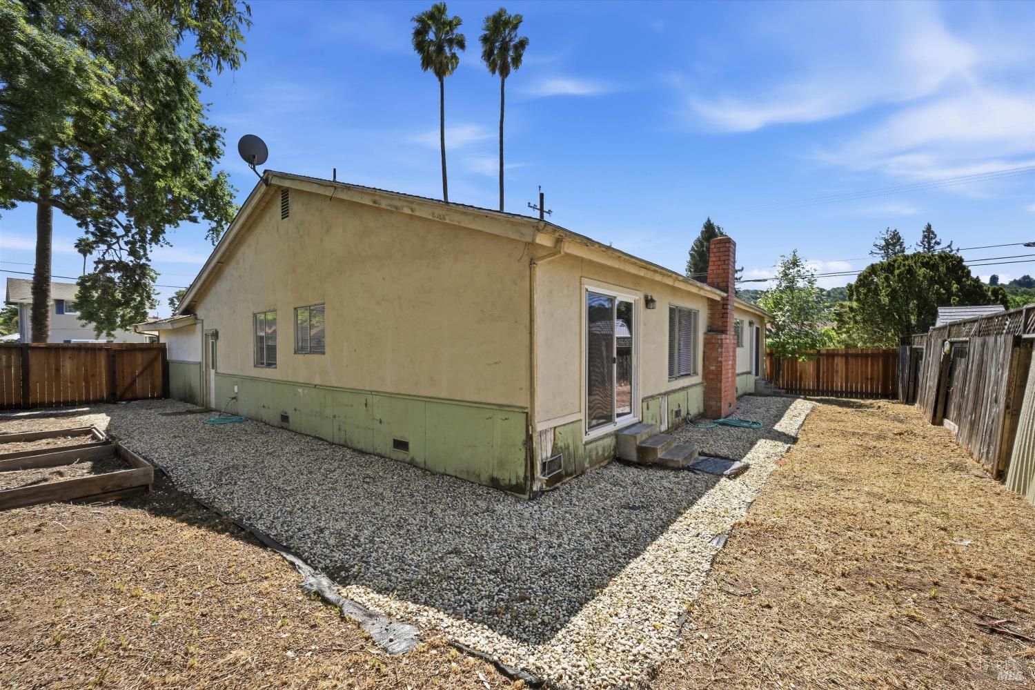 2537 Tamarisk Drive Santa Rosa, CA 95405 - Photo 22 of 25 a view of a house with a backyard