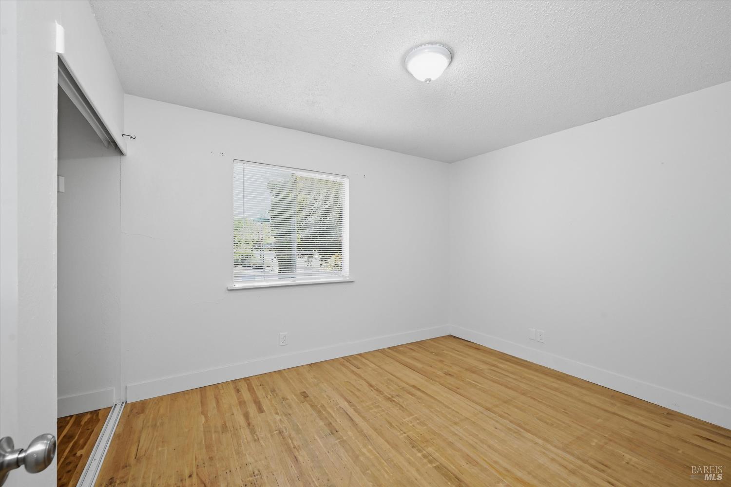 2537 Tamarisk Drive Santa Rosa, CA 95405 - Photo 6 of 25 an empty room with a window