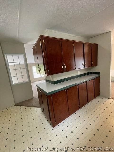981 Black Road Cameron, NC 28326 - Photo 20 of 39 a view of kitchen with wooden cabinet