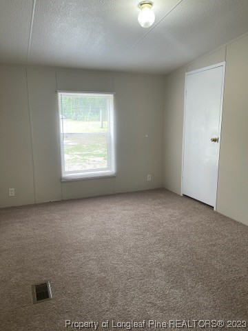 981 Black Road Cameron, NC 28326 - Photo 25 of 39 an empty room with a window