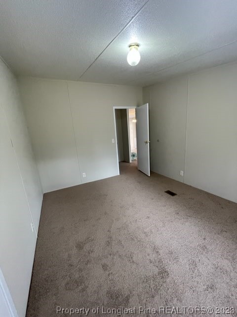 981 Black Road Cameron, NC 28326 - Photo 27 of 39 an empty room with a natural light