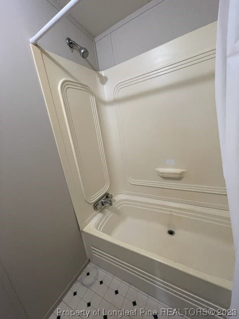 981 Black Road Cameron, NC 28326 - Photo 32 of 39 a bathroom with a bathtub and a shower